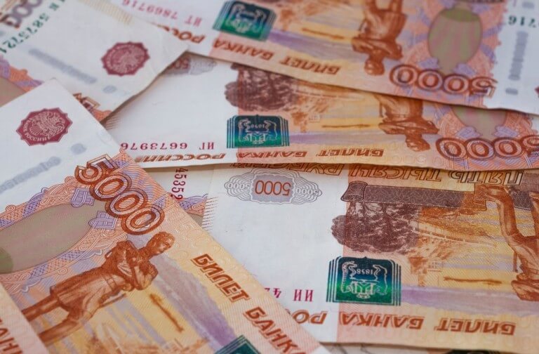 Russian ruble falling against the dollar, down 30% since the beginning of the year